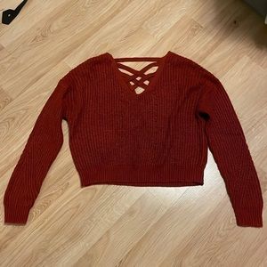 Aeropostale red sweater with a opening in the back!